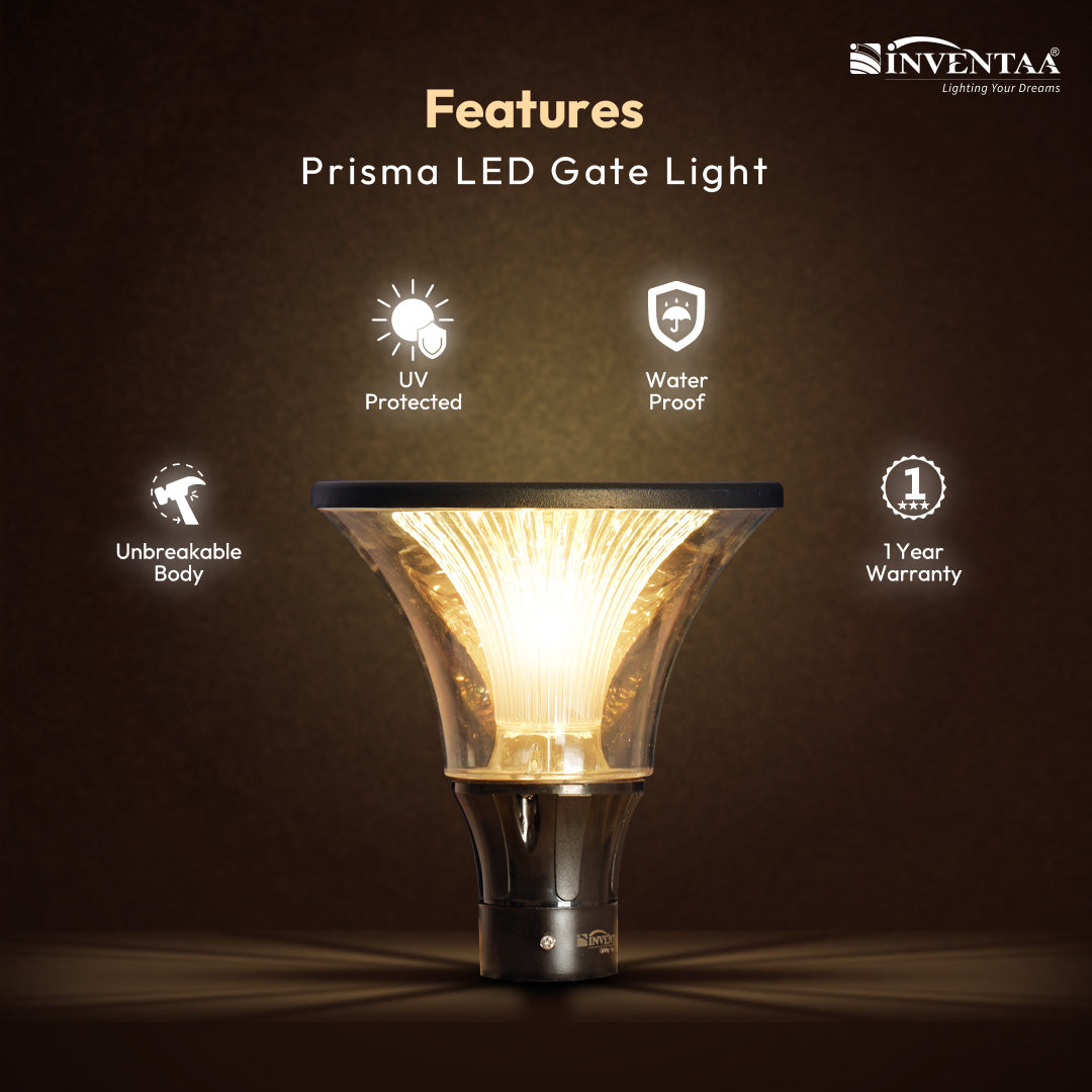 Inventaa Prisma 12W LED gate pillar light installed on home entrance pillar glowing warm white at night — outdoor gate lamp for main gate boundary wall by Inventaa Chennai